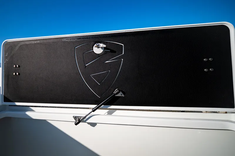  Yacht Photos Pics 2016 Barker Boatworks 26 Calibogue Bay, black panel with logo, under clear blue sky.