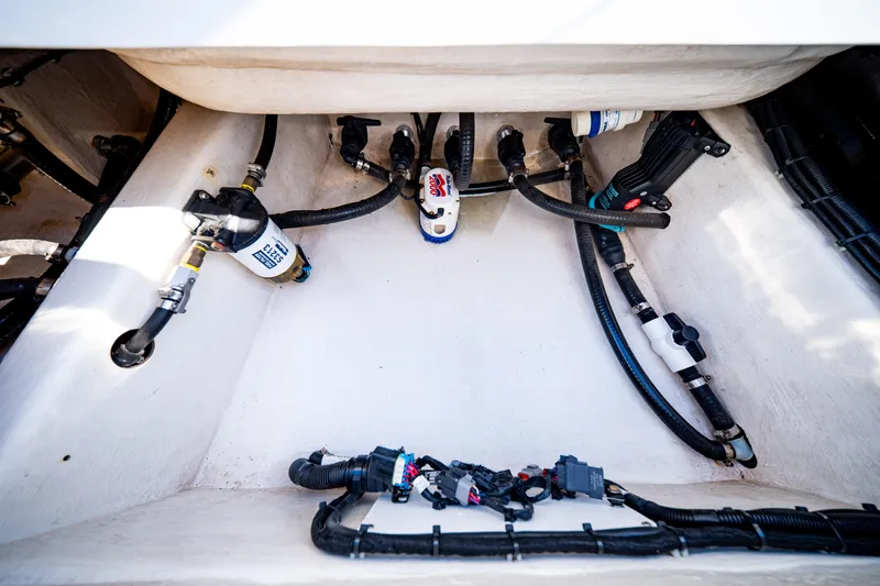  Yacht Photos Pics 2016 Barker Boatworks 26 Calibogue Bay engine compartment with hoses and filters.