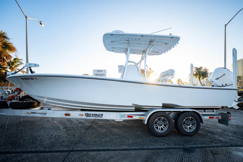  Yacht Photos Pics 2016 Barker Boatworks 26 Calibogue Bay on trailer at sunrise, side view.