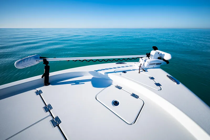  Yacht Photos Pics 2016 Barker Boatworks 26 Calibogue Bay on calm ocean waters, featuring a Minn Kota trolling motor.
