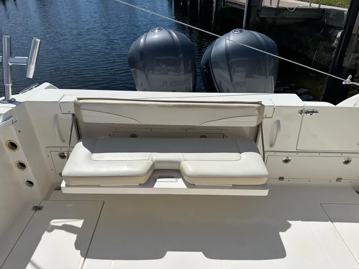 Last One II Yacht Photos Pics 2015 Wellcraft 290 Coastal boat with dual engines and foldable seating.