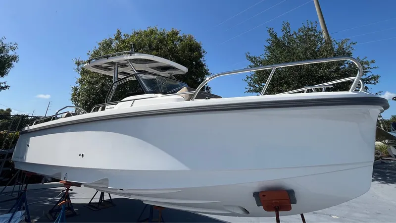 In-stock 2024 Nimbus T8 #314 Yacht Photos Pics 2024 Nimbus Tender 8 #314 boat on display, featuring sleek design and modern structure.