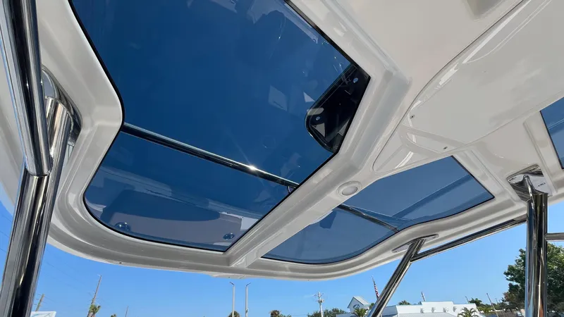 In-stock 2024 Nimbus T8 #314 Yacht Photos Pics Rooftop view of 2024 Nimbus Tender 8 #314 with blue-tinted glass panels.