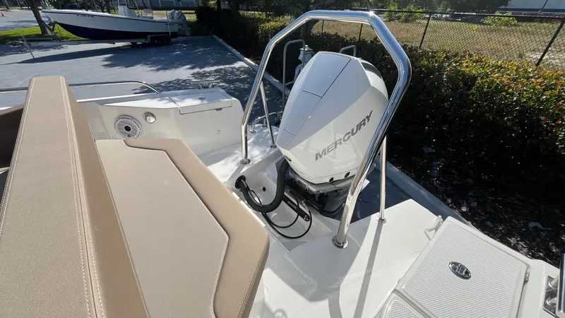 In-stock 2024 Nimbus T8 #314 Yacht Photos Pics 2024 Nimbus Tender 8 #314 with Mercury outboard engine, beige seating, and sleek design.