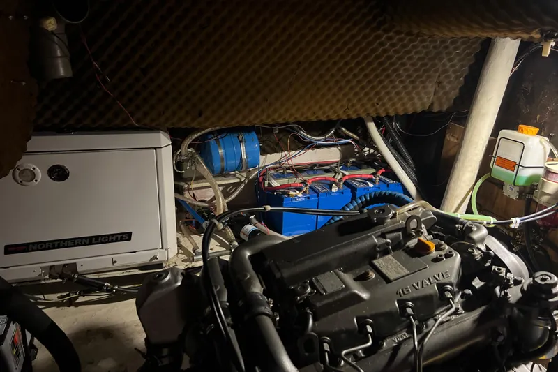 Hobo Tiempo Yacht Photos Pics Engine room of 1986 Amel Mango sailboat with Northern Lights generator and wiring.