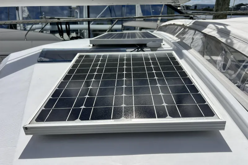 Hobo Tiempo Yacht Photos Pics Solar panels on 1986 Amel Mango yacht deck, harnessing renewable energy.