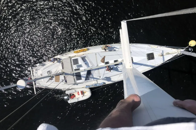 Hobo Tiempo Yacht Photos Pics Overhead view of 1986 Amel Mango sailboat on sparkling water.