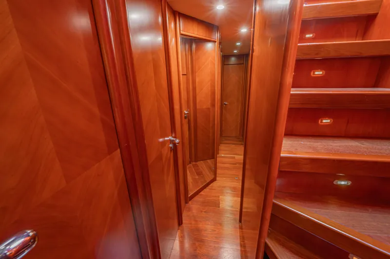 Isabella K Yacht Photos Pics Luxurious wooden interior of 2002 Astondoa 72 GLX yacht hallway with stairs.