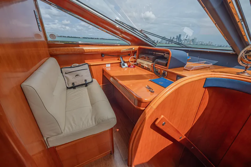Isabella K Yacht Photos Pics Luxurious 2002 Astondoa 72 GLX yacht interior with elegant wood finish and panoramic windows.
