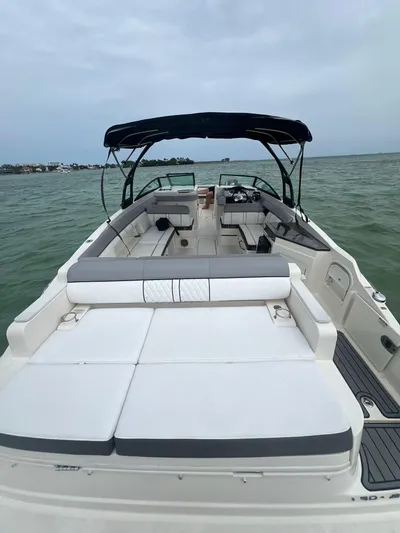  Yacht Photos Pics 2017 Sea Ray SDX 290 Outboard boat with spacious seating on open water.