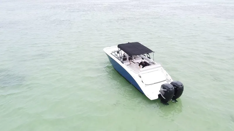  Yacht Photos Pics 2017 Sea Ray SDX 290 Outboard boat on calm, clear water.