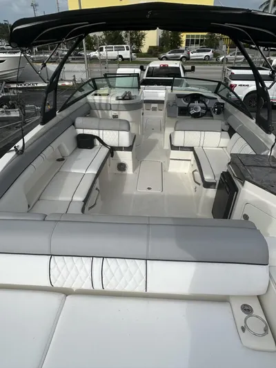  Yacht Photos Pics 2017 Sea Ray SDX 290 Outboard boat with spacious seating and sleek design.