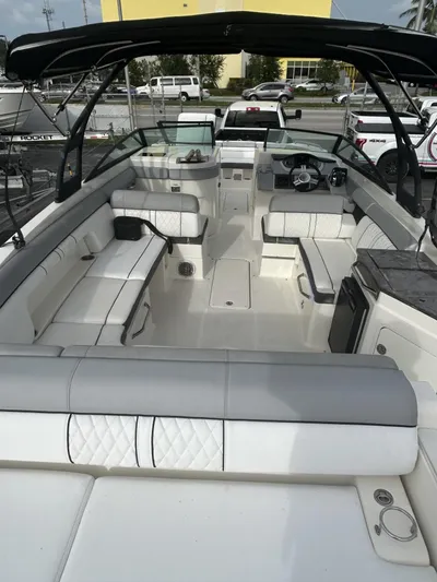  Yacht Photos Pics 2017 Sea Ray SDX 290 Outboard boat with spacious seating and sleek design.