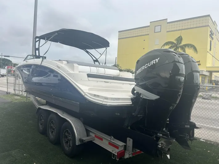  Yacht Photos Pics 2017 Sea Ray SDX 290 Outboard boat with twin Mercury engines on a trailer.