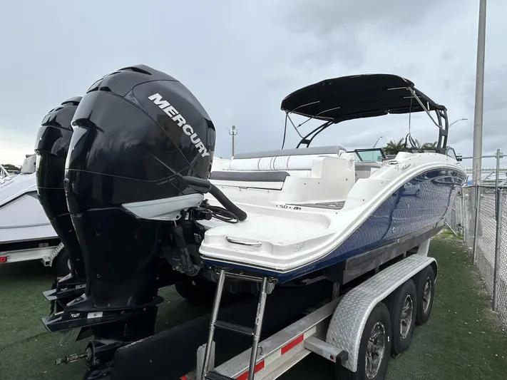  Yacht Photos Pics 2017 Sea Ray SDX 290 Outboard boat with dual Mercury engines on a trailer.
