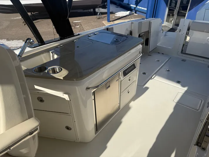  Yacht Photos Pics Interior of 2022 Boston Whaler 320 Vantage with kitchenette.