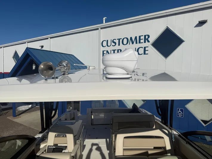  Yacht Photos Pics Boston Whaler 320 Vantage 2022 near customer entrance.