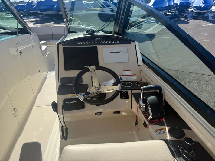  Yacht Photos Pics Interior view of 2022 Boston Whaler 320 Vantage cockpit.