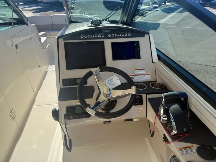  Yacht Photos Pics 2022 Boston Whaler 320 Vantage helm with modern controls.