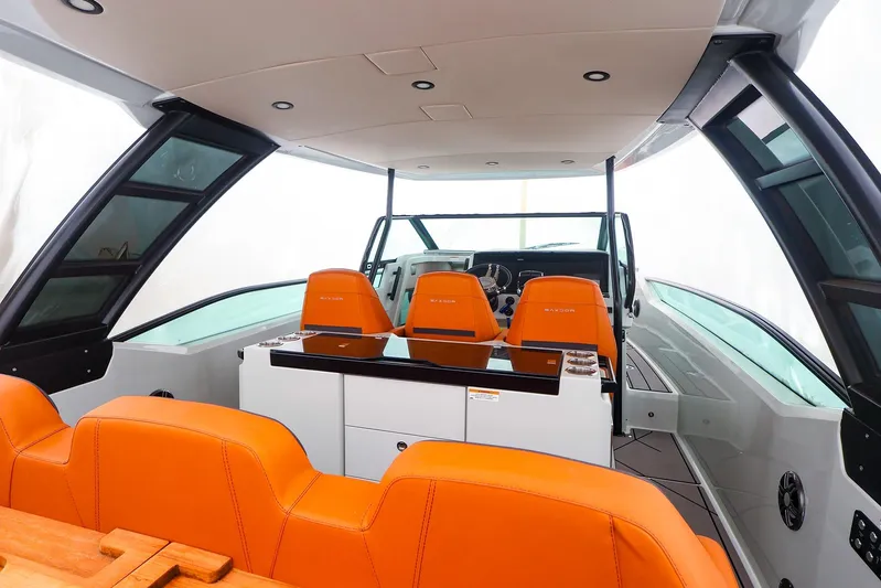  Yacht Photos Pics Interior of 2023 Saxdor 320 GTO boat with orange seating and modern design.