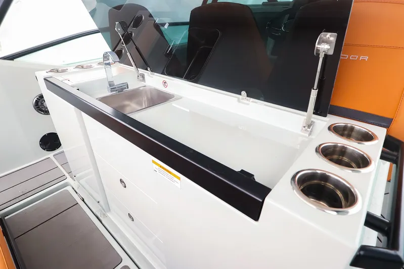  Yacht Photos Pics 2023 Saxdor 320 GTO boat interior with sink and cup holders.