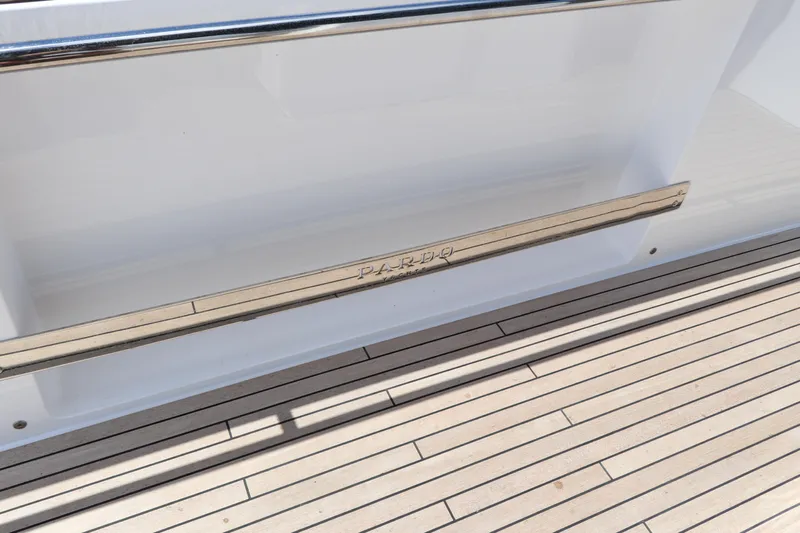  Yacht Photos Pics 2024 Pardo Yachts P43 deck with sleek wood finish and stainless steel railing.