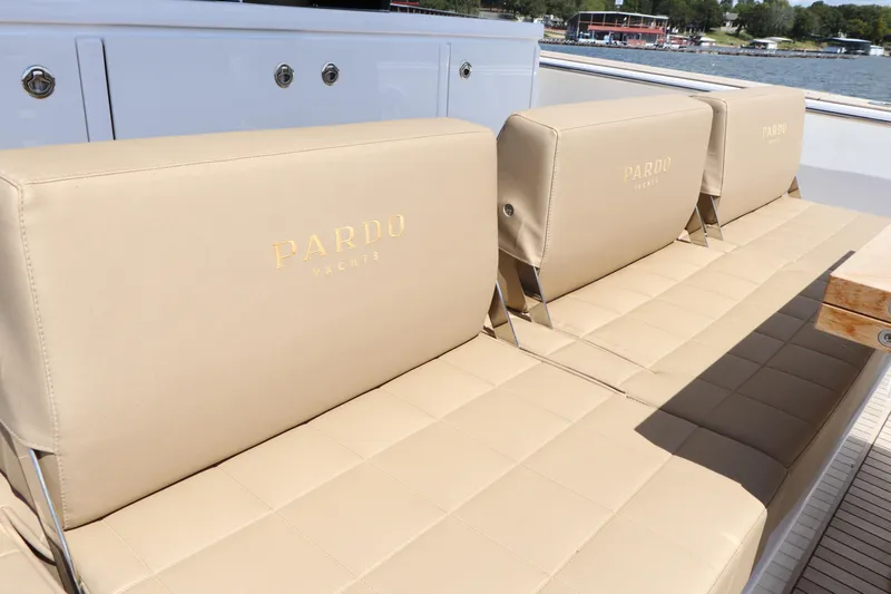  Yacht Photos Pics Beige seating on 2024 Pardo Yachts P43, dockside view.