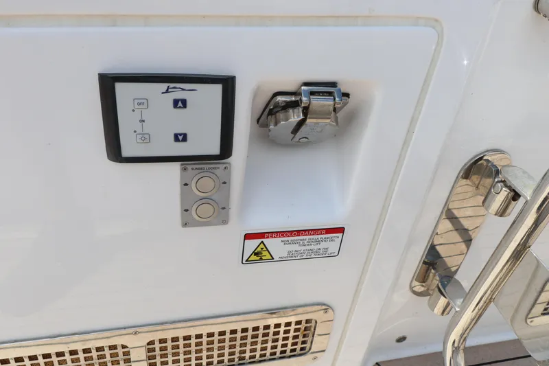  Yacht Photos Pics Control panel on 2024 Pardo Yachts P43, featuring buttons and safety warning.