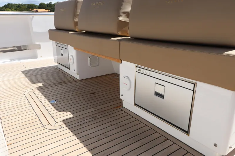  Yacht Photos Pics 2024 Pardo Yachts P43 deck with cushioned seating and storage compartments.