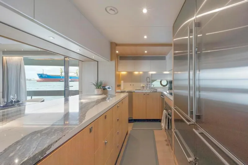 Bella Tu Yacht Photos Pics Galley w/Marble Counters and Stainless Fridge