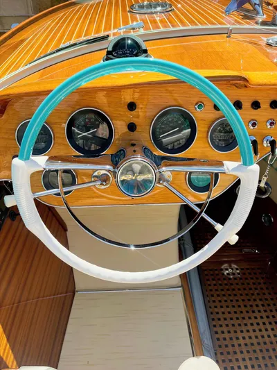 Turquoise Yacht Photos Pics 1974 Riva Aquarama Special dashboard with vintage steering wheel and gauges.