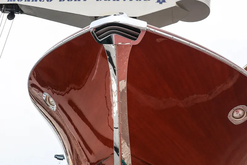 Turquoise Yacht Photos Pics 1974 Riva Aquarama Special boat with polished wooden hull and chrome details.