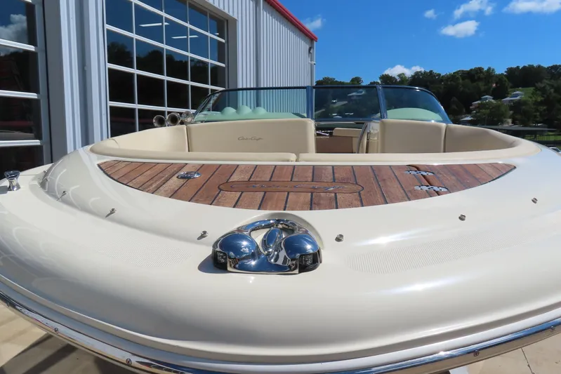  Yacht Photos Pics 2018 Chris Craft Launch 34 boat with elegant teak deck and sleek design.