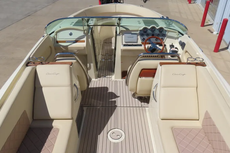  Yacht Photos Pics 2018 Chris Craft Launch 34 boat interior with luxurious seating and elegant dashboard design.