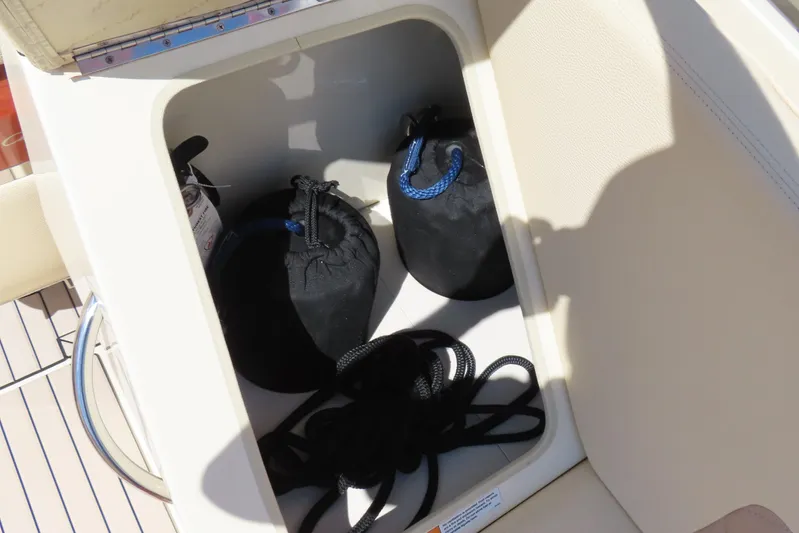  Yacht Photos Pics Storage compartment on 2018 Chris Craft Launch 34 boat with ropes and bags.