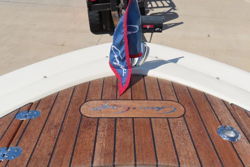  Yacht Photos Pics 2018 Chris Craft Launch 34 boat with wooden deck and flag.
