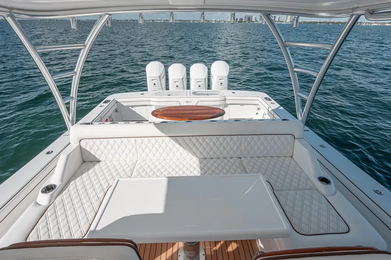  Yacht Photos Pics 2024 Valhalla Boatworks V-55 luxury deck with seating and ocean view.