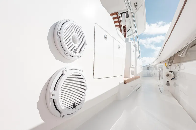  Yacht Photos Pics 2024 Valhalla Boatworks V-55 deck with speakers and storage compartments.