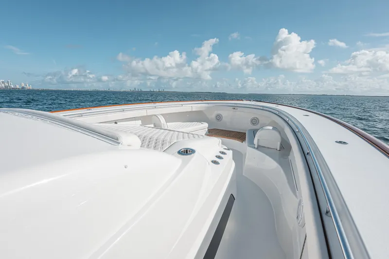  Yacht Photos Pics 2024 Valhalla Boatworks V-55 luxury yacht on open sea under blue sky.