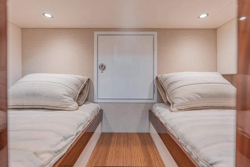  Yacht Photos Pics 2024 Valhalla Boatworks V-55 cabin interior with twin beds and modern design.