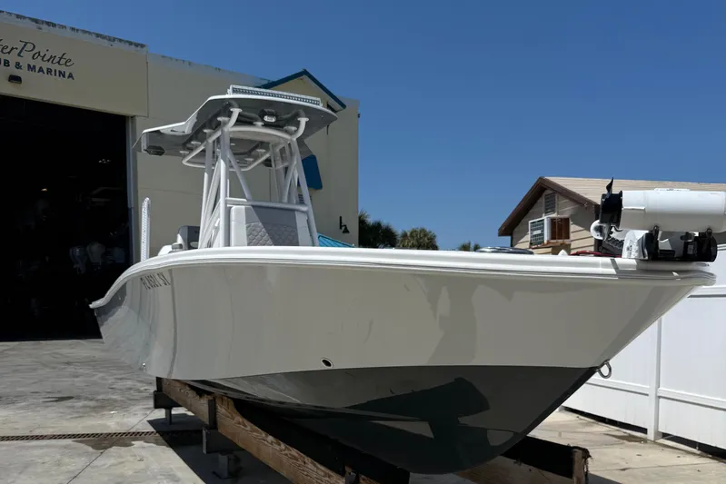  Yacht Photos Pics 2022 ZCB 26 Freemason boat docked at marina under clear blue sky.