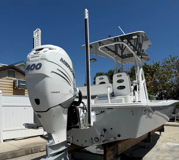  Yacht Photos Pics 2022 ZCB 26 Freemason boat with Mercury 400 engine, docked outdoors.
