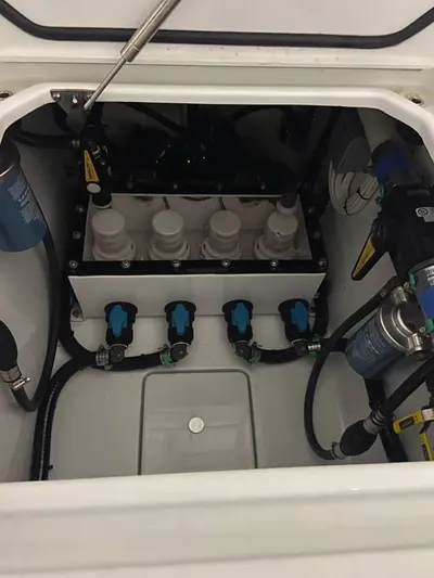  Yacht Photos Pics 2024 Contender 35 ST boat engine compartment with fuel and water systems.