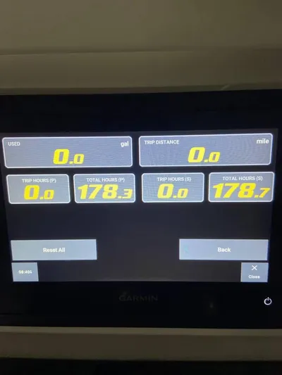  Yacht Photos Pics 2024 Contender 35 ST dashboard display showing trip and total hours.