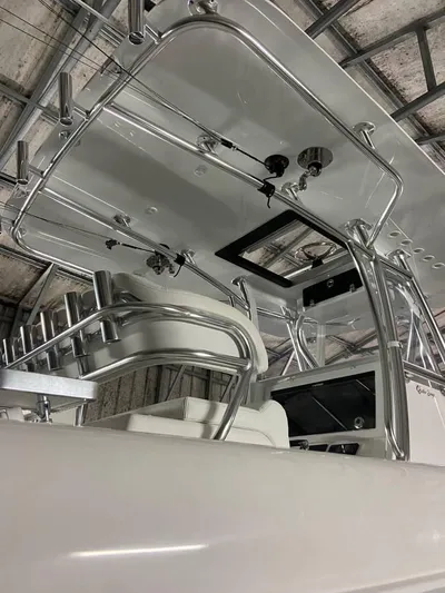  Yacht Photos Pics 2024 Contender 35 ST boat with sleek design and modern features.