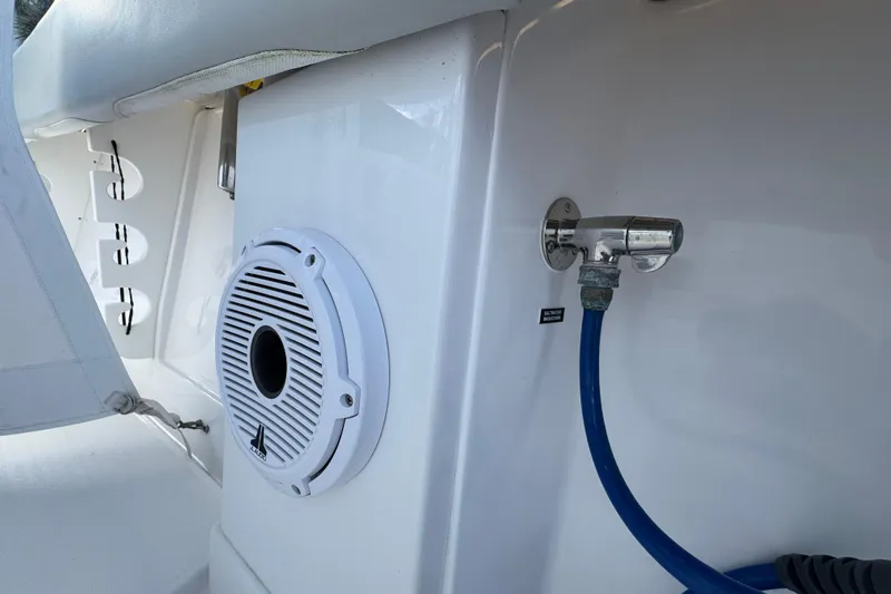 High Steaks Yacht Photos Pics 2024 Jupiter 38 HFS boat interior with speaker and hose connection.