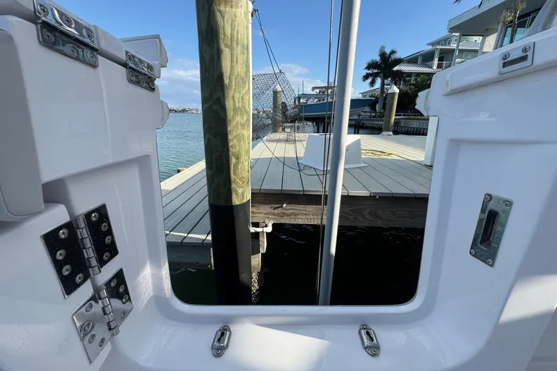 High Steaks Yacht Photos Pics 2024 Jupiter 38 HFS boat view from deck, dockside with clear blue sky.