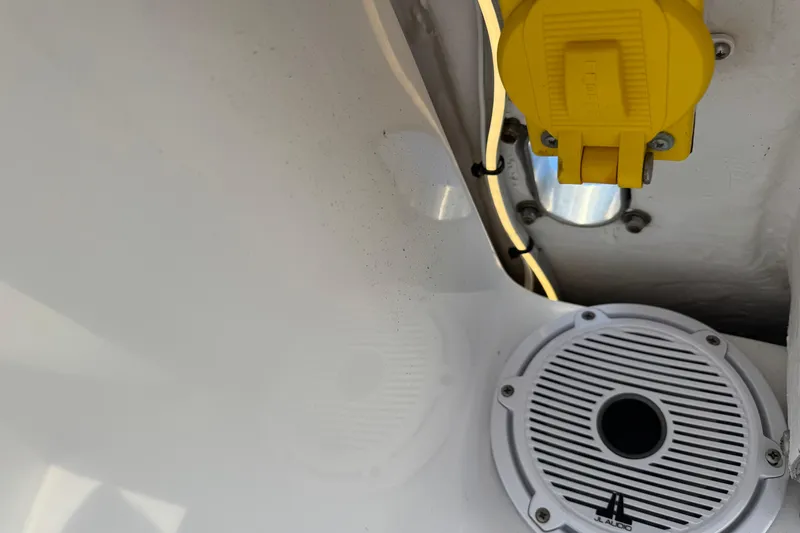 High Steaks Yacht Photos Pics 2024 Jupiter 38 HFS boat detail with yellow plug and JL Audio speaker.