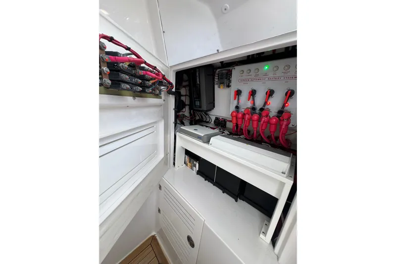High Steaks Yacht Photos Pics 2024 Jupiter 38 HFS battery system with red cables and control panel.