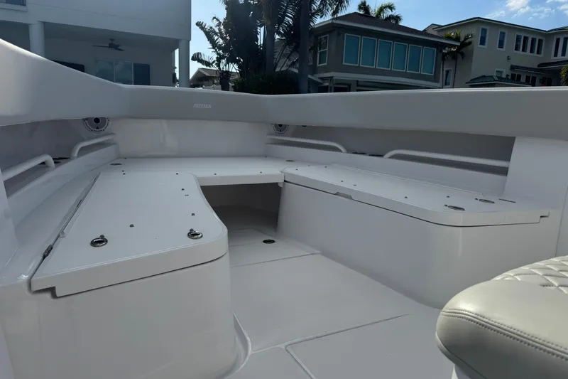 High Steaks Yacht Photos Pics 2024 Jupiter 38 HFS boat interior with sleek white seating and modern design.